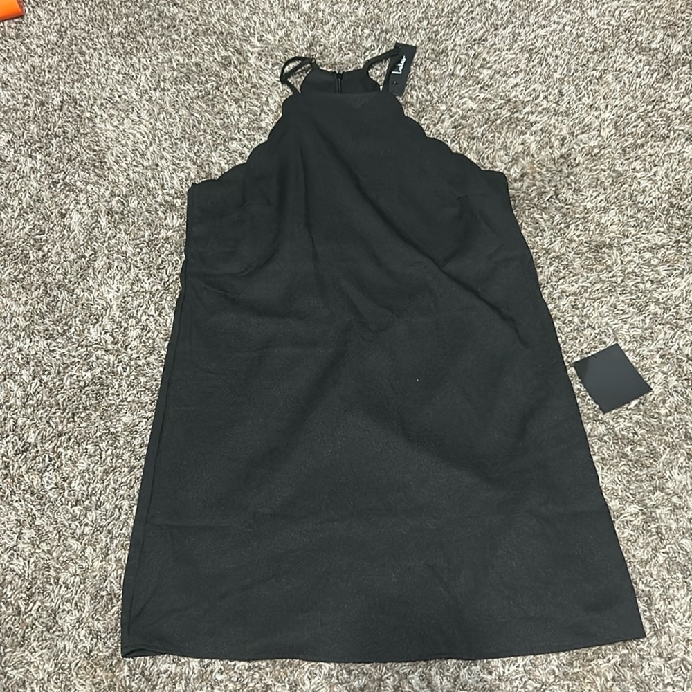 Tag still on, size is small and brand is lulus. Very cute dress not my size